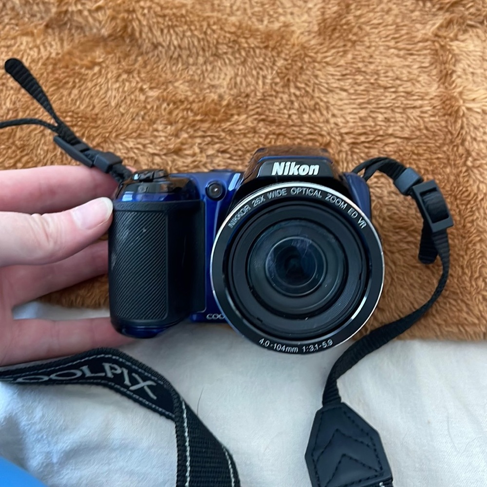 Nikon camera with case and rechargeable batteries